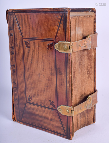 A VICTORIAN LEATHER BOUND BIBLE. 14 cm x 22 cm.