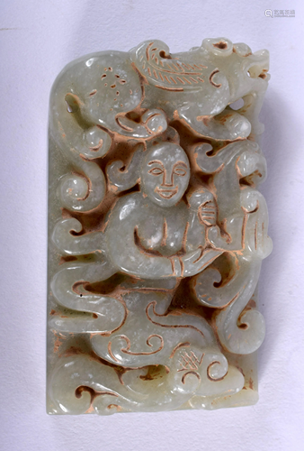 A CHINESE CARVED JADE TABLET. 4 cm x 6 cm.