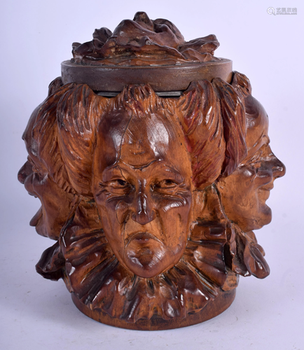 AN ANTIQUE CONTINENTAL TREEN CARVE…