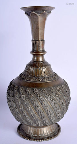 A 19TH CENTURY INDIAN SPIRAL FORM BRONZ…