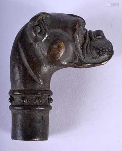 A BRONZE DOG CANE HANDLE. 7 cm x 4 cm.