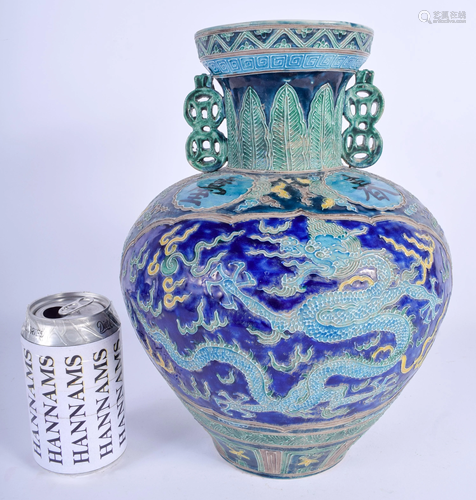 A CHINESE TWIN HANDLED PORCELAIN VASE 2…