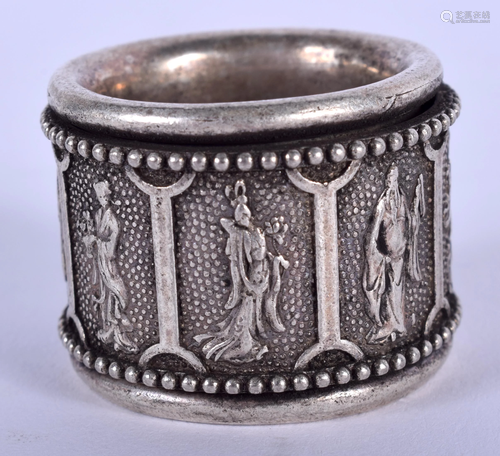 A CHINESE WHITE METAL ARCHERS RING. 3 cm …