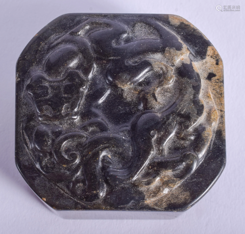 A CHINESE CARVED JADE SEAL. 4.5 cm square.