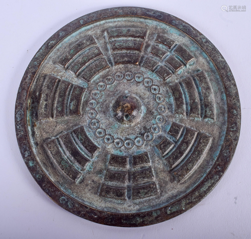 A CHINESE BRONZE HAND MIRROR. 11 cm wide.