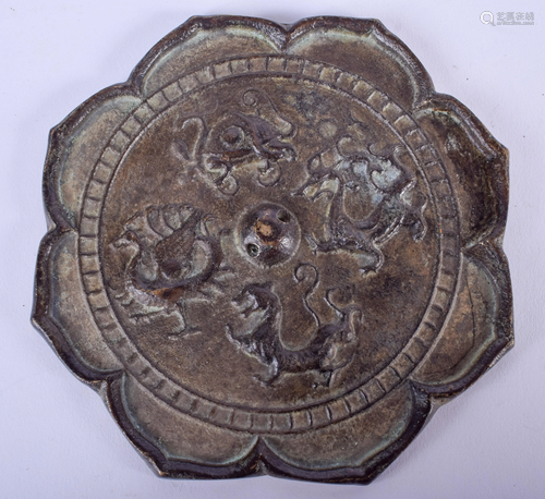 A CHINESE BRONZE HAND MIRROR. 11 cm wide.