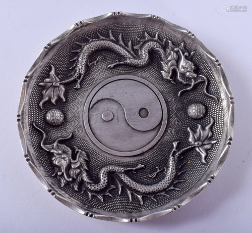 A CHINESE WHITE METAL DISH. 9 cm wide.