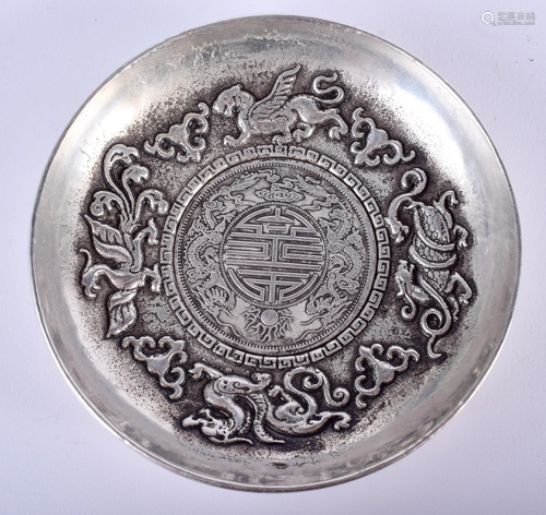 A CHINESE WHITE METAL DISH. 9 cm wide.