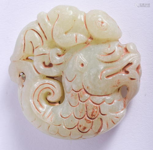 A CHINESE JADE ROUNDEL. 5.25 cm wide.