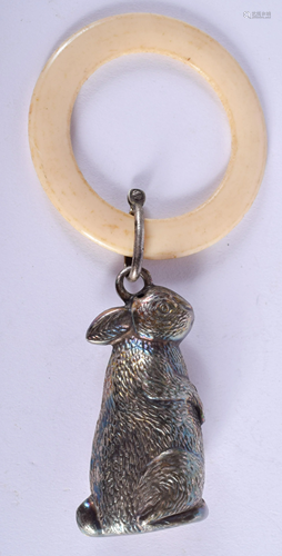 A SILVER BABIES RATTLE. Silver 5.5 cm x 2 cm.