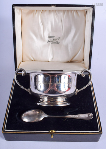 A SILVER MOUNTED TWIN HANDLED BOWL with …