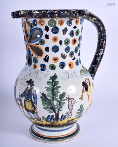 AN ANTIQUE FRENCH FAIENCE PUZZLE JUG. 22 cm…