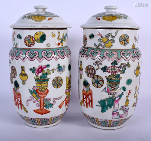 A PAIR OF CHINESE FAMILLE ROSE VASES AND CO…