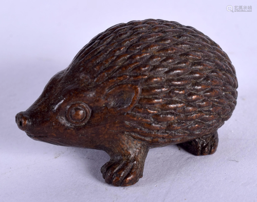 A JAPANESE BRONZE HEDGEHOG OKIMONO. 4 c…