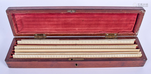 A CASED VICTORIAN BONE RULER SET within a m…