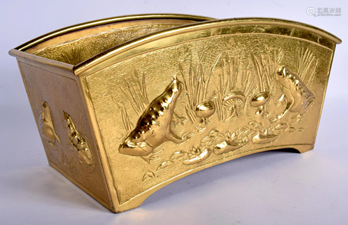 AN ARTS AND CRAFTS BRASS PLANTER. 36 cm x 20 …