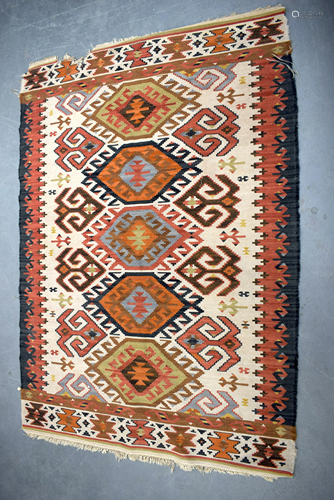 SIX ANTIQUE RUGS in various forms and sizes. (6)