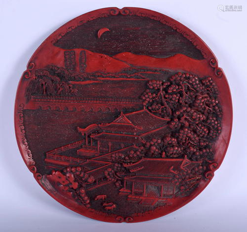 A CHINESE RED LACQUER DISH. 24 cm wide.