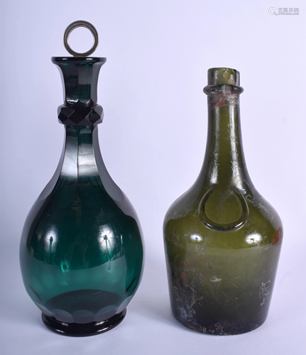 AN ANTIQUE GREEN GLASS DECANTER AND STOP…