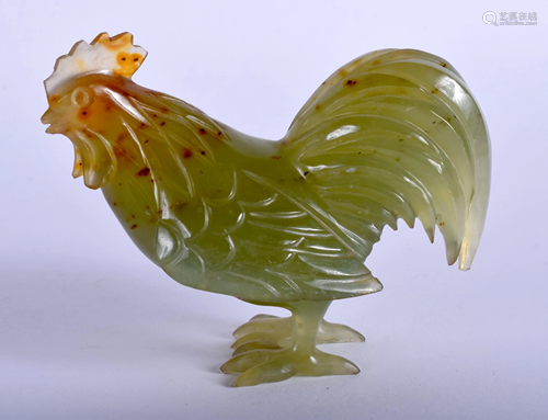 A 1930S CHINESE CARVED JADE COCK FOWL. …