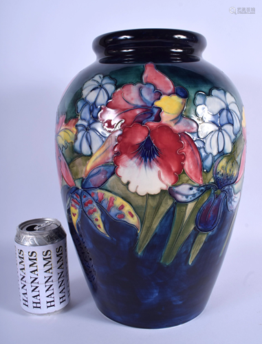 A LARGE ANTIQUE MOORCROFT VASE decorated…