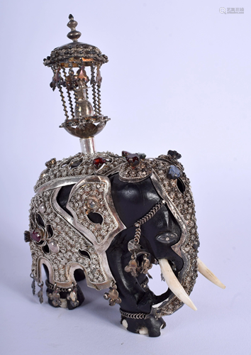 AN ANTIQUE INDIAN BONE ELEPHANT with silver …