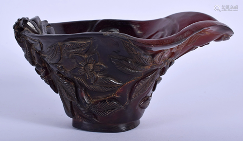 A CHINESE CARVED BUFFALO HORN TYPE LIBATIO…