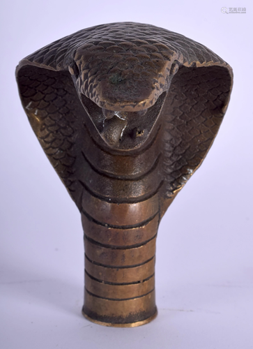 A CONTINENTAL BRONZE COBRA SNAKE HAN…