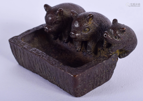 A JAPANESE BRONZE PIG TROUGH OKIMONO. 4.5…