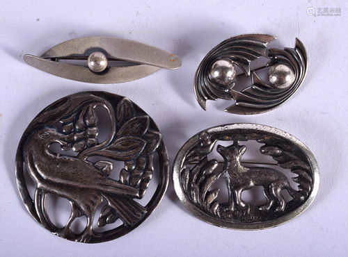 FOUR CONTINENTAL SILVER BROOCHES. (4)