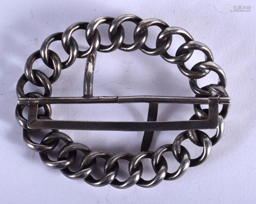 A SILVER BROOCH. 8 cm wide.