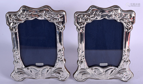 A PAIR OF SILVER PHOTOGRAPH FRAMES. 14 c…