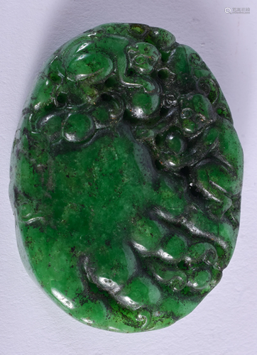 A CHINESE JADEITE AMULET. 3.5 cm x 4.25 cm.