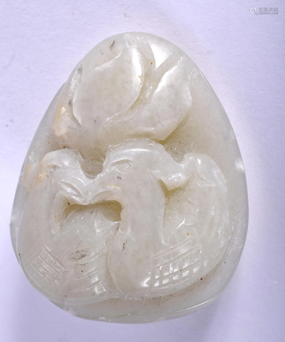 A CHINESE JADE AMULET. 4 cm x 3 cm.