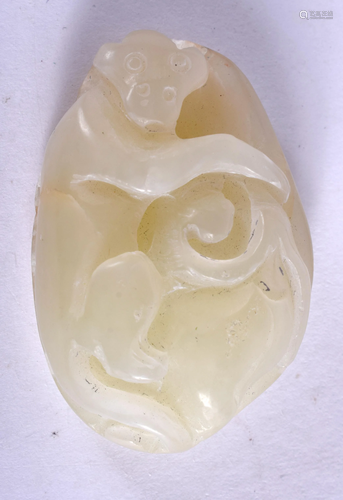 A CHINESE JADE AMULET. 4 cm x 3 cm.