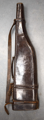 AN ANTIQUE LEATHER LEG OF LAMB GUN CASE. 76…