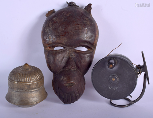 AN AFRICAN MASK together with a fishing reel e…