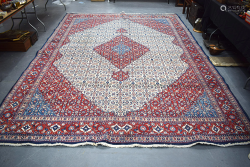 A LARGE VINTAGE PERSIAN MAHI RUG Made in …