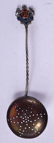 A SILVER SPOON. 9 cm long.