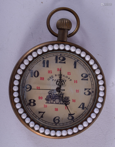 A LOCOMOTIVE POCKET WATCH. 5 cm wide.