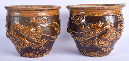 A PAIR OF CHINESE BROWN GLAZED JARDINIERE…