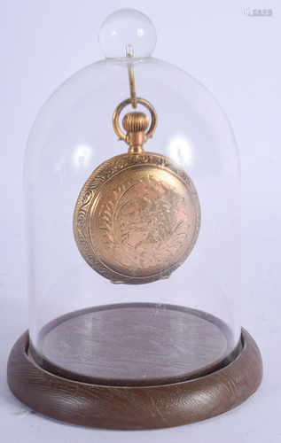 A YELLOW METAL POCKET WATCH. 4 cm wide.