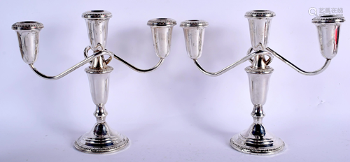 A PAIR OF SILVER CANDLESTICKS. 47.7 oz wei…