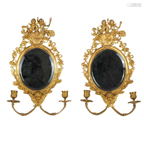 Pair of Bronze Figural Mirrored Sconces