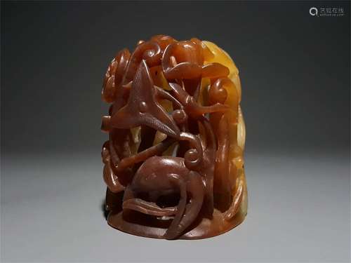 A CHINESE CARVED HETIAN JADE ORNAMENT