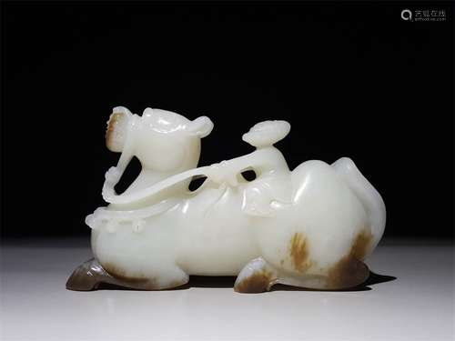 A CHINESE CARVED HETIAN JADE CAMEL ORNAMENT