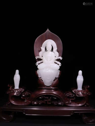 A SET OF CARVED WHITE JADE ORNEMENTS