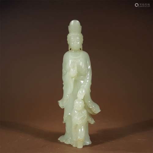 A QING DYNASTY CARVED WHITE JADE GUANYIN STATUE
