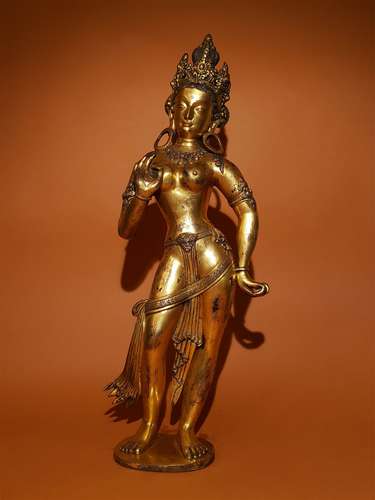 A YUAN DYNASTY GILTING BRONZE GUANYIN STATUE