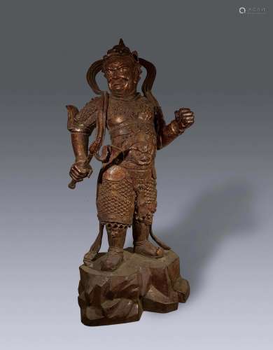 A MING DYNASTY PAINT GOLD HEAVENLY KING STATUE